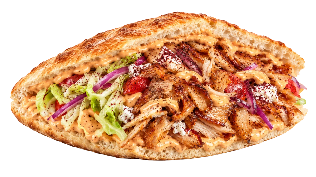 Chicken Döner im Fladenbrot mit Salat, Zwiebeln, Tomate und Soße